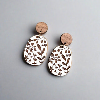 laser cut wood earrings with floral etching